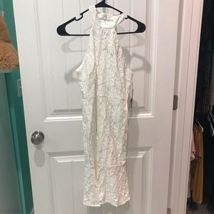 White trumpet halter top style dress